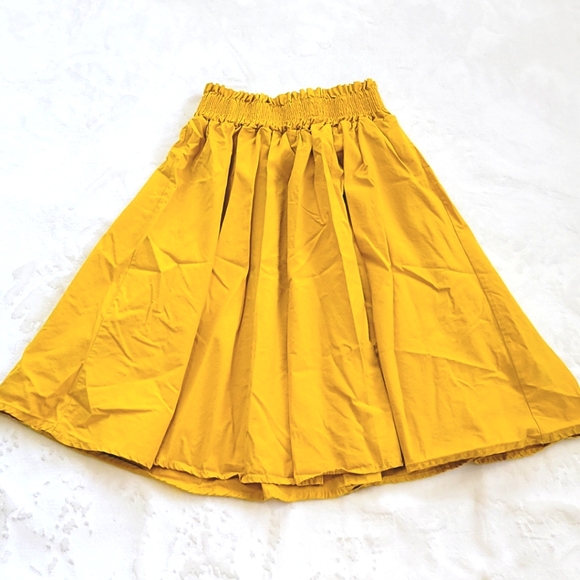 Brandy Melville Dresses & Skirts - NWOT!! MJSTARD YELLOW TAN ELASTIC WAIST SKIRT